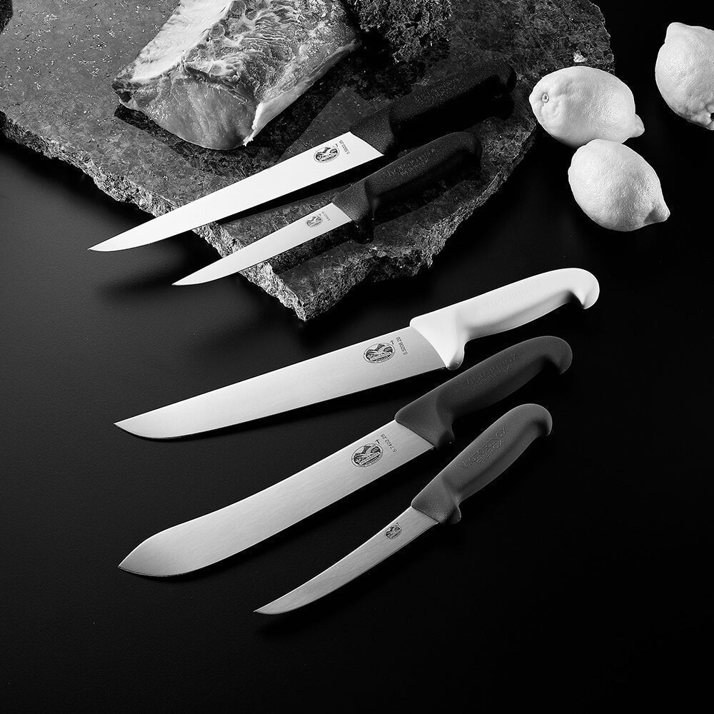 Knife for vegetables with white ceramic blade Victorinox Kitchen Knives  Products